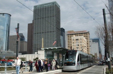 As in this example from Houston's light rail system, urban rail would be powered by electricity and operate mainly in the street — in Austin's case, Guadalupe and Lamar. Photo: Peter Ehrlich.