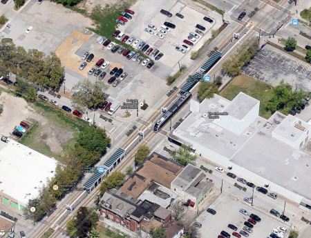 Aerial view of MetroRail on Main St. at Ensemble-HCC station. Photo: Screen capture by L. Henry from Google Maps.