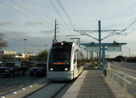 Houston's MetroRail demonstrates that LRT can attract and carry more passengers faster, more effectitly and safely, more cost-effectively than high-capacity bus operations. Photo: Peter Ehrlich.