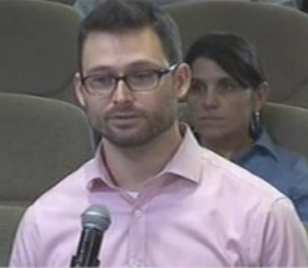 Marcus Denton announces AURA's opposition to Project Connect plan at CCAG meeting. Screenshot from City of Austin video.