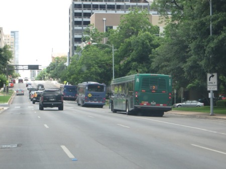 Buses use curbside reserved lanes on one-way Lavaca St. downtown. Curbside lanes on the Drag would be similar, but on two-way street. Photo: L. Henry.