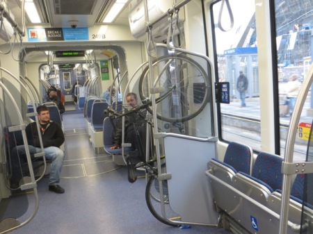 Bikes can be hung on special racks inside the LRT cars. Photo: L. Henry.