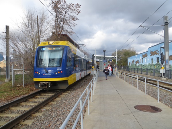 Blue Line train at Cedar-Riverside station, closer in to the CBD, where the former railroad ROW is quite narrow. This is similar to the narrow railroad ROW of Austin's MetroRail (Red Line), which ARN and other groups have advocated to be converted to LRT (from its current status as a diesel-propulsion light railway). LRT's electric propulsion enables faster, smoother train operation that is less costly, cleaner, and friendlier to urban livability.