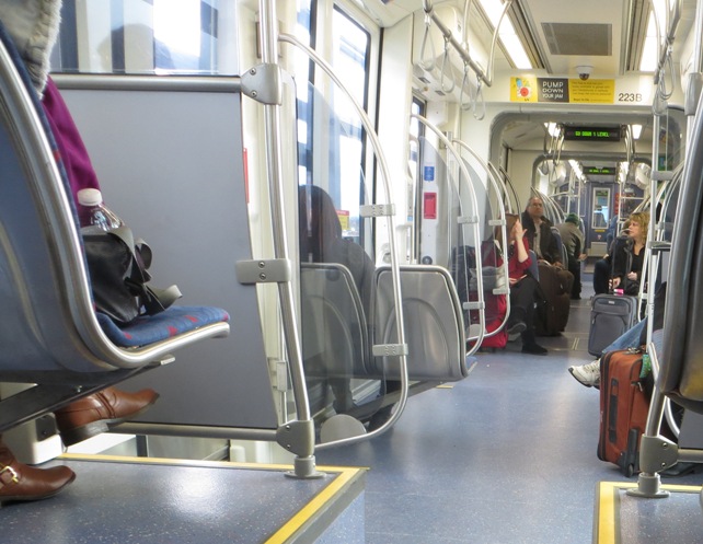 Lots of visible baggage on Blue Line train gives an indication that LRT service to Minneapolis's airport is well-used by air passengers. Photo: L. Henry.